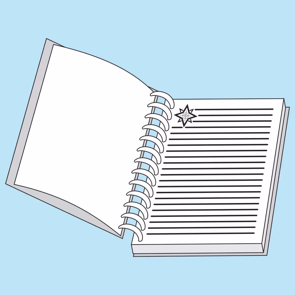 Spiral-bound notebook with a dark blue cover on a light blue background.