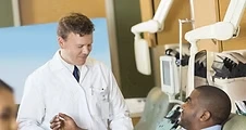 Doctor discussing medical requirements with a patient for commercial motor vehicle drivers.