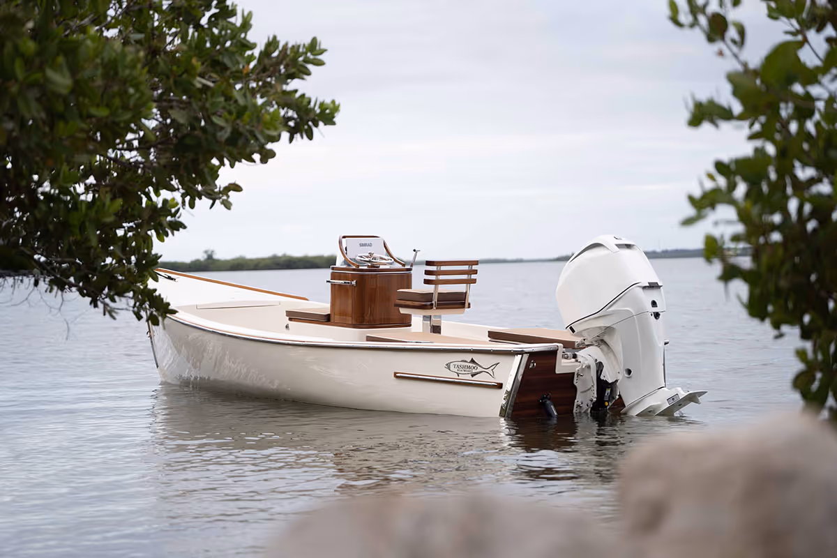 Custom skiff on shallow water