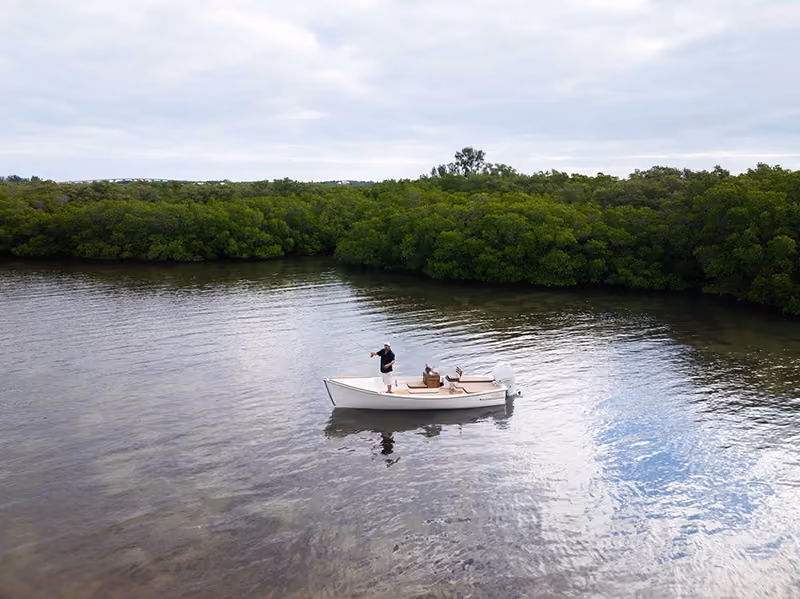 boater fishing on custom boat