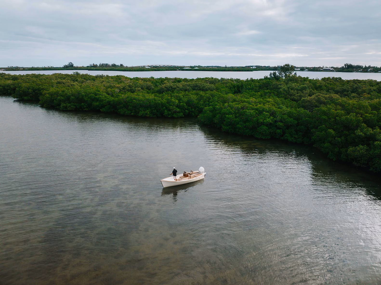 Man and woman sailing a skiff