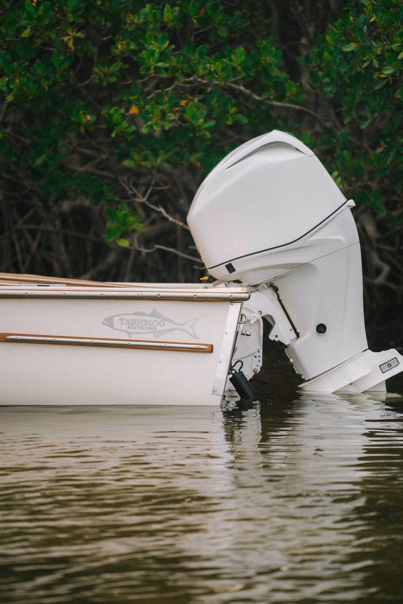 Custom skiff on shallow water