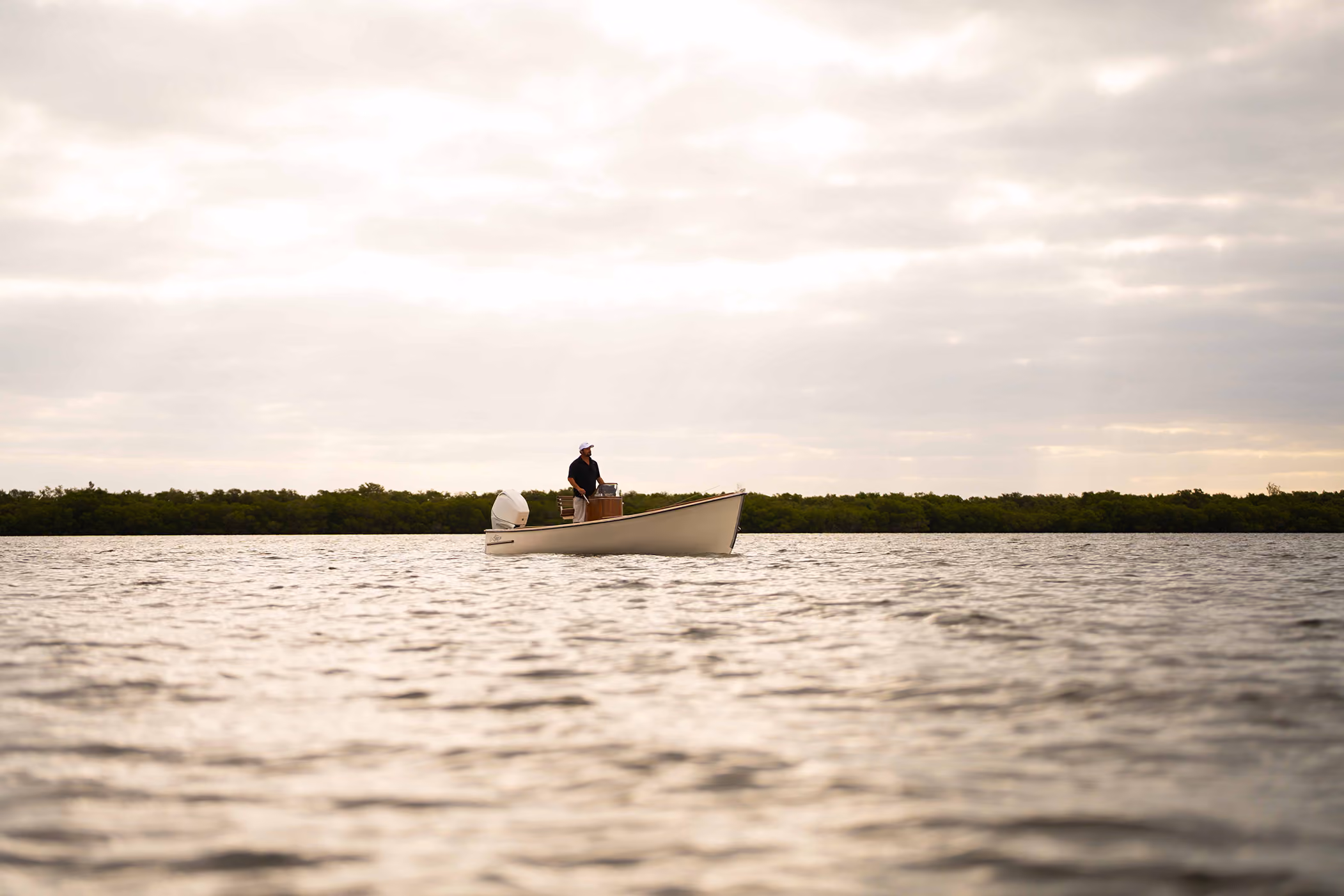 Custom skiff on shallow water