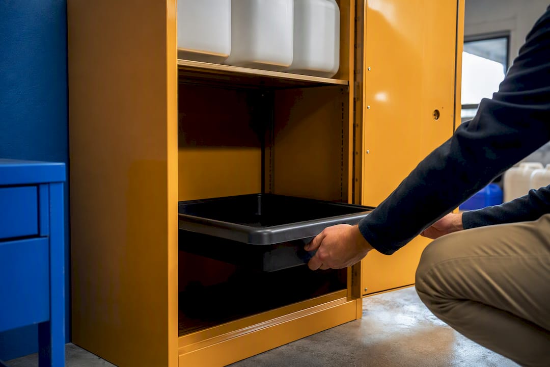 Secondary containment tray inside safety cabinet