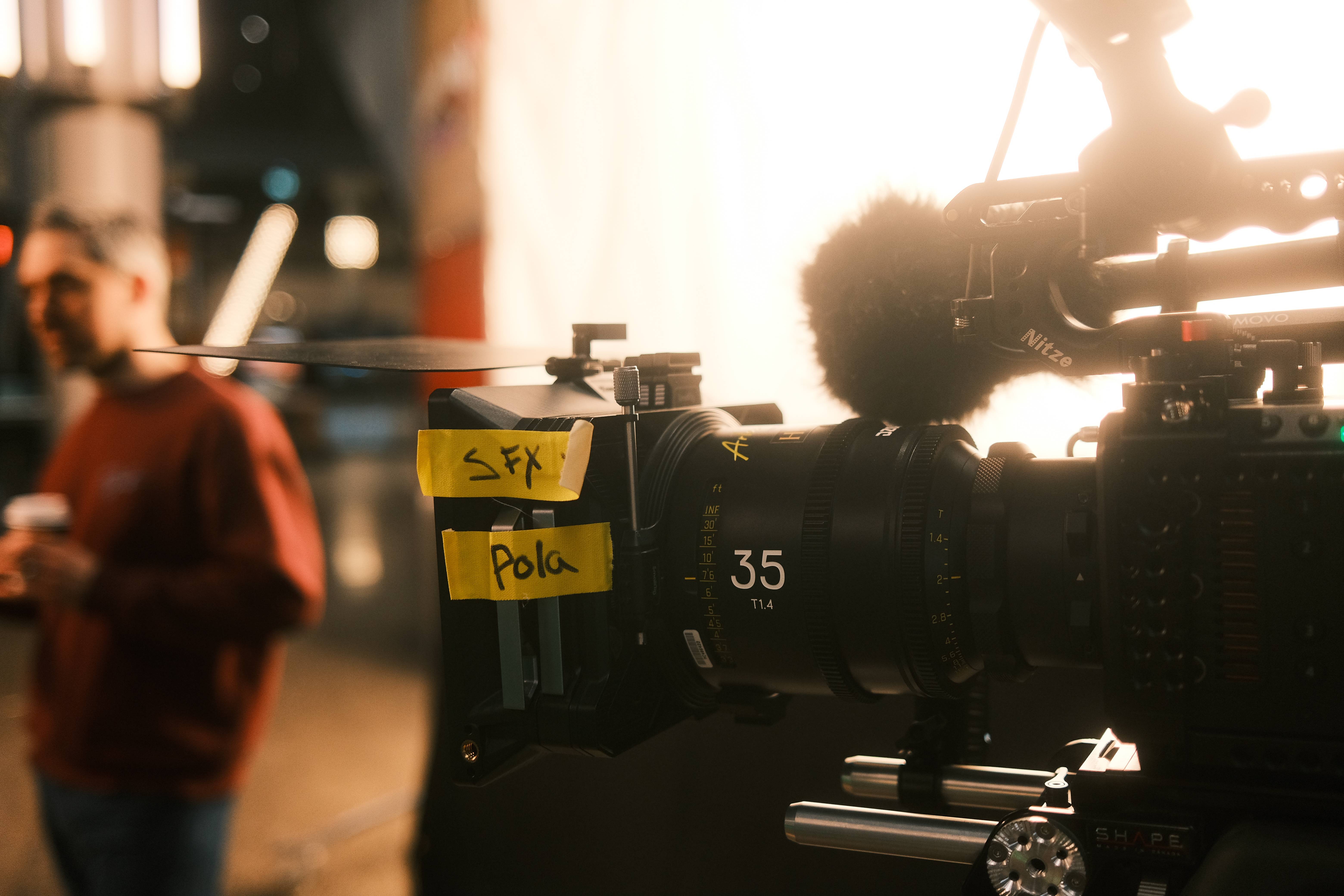 [background image] image of office workspace with desks (for a film production company)