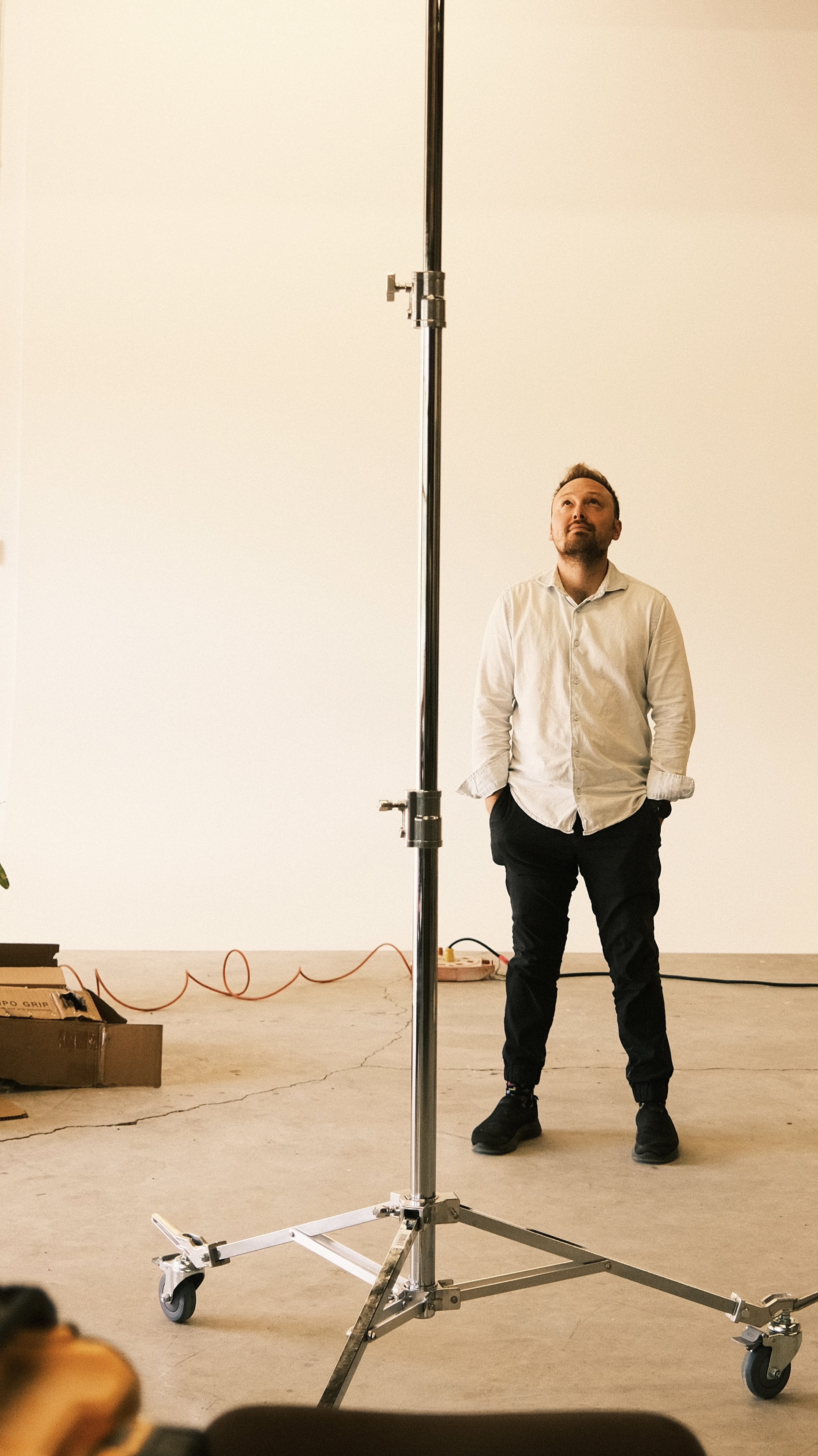 [background image] image of office workspace with desks (for a film production company)
