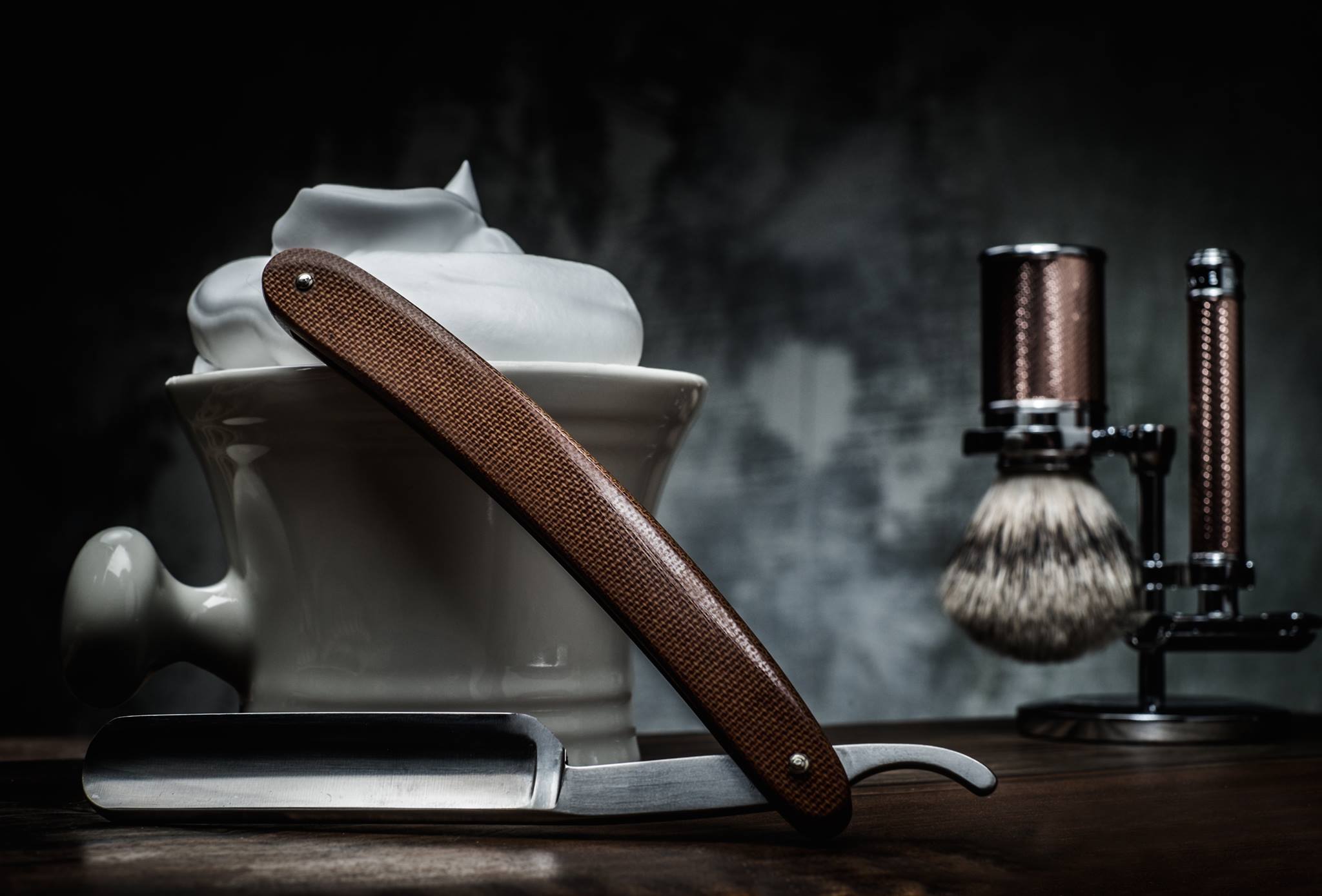 A razor, shaving foam and brush.