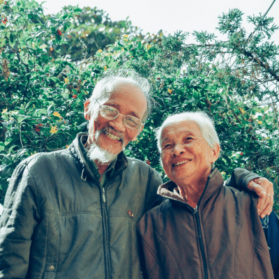 Seniors, man and woman smiling