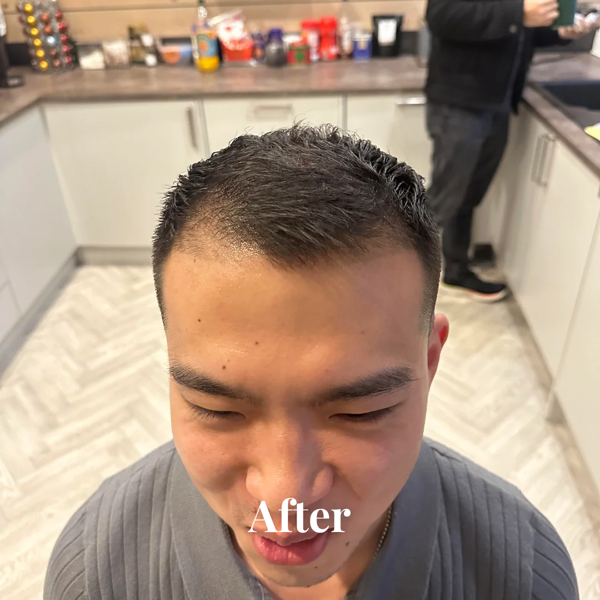 Top view of a young man with a fresh, short haircut in a kitchen, with the word 'After' overlaid.