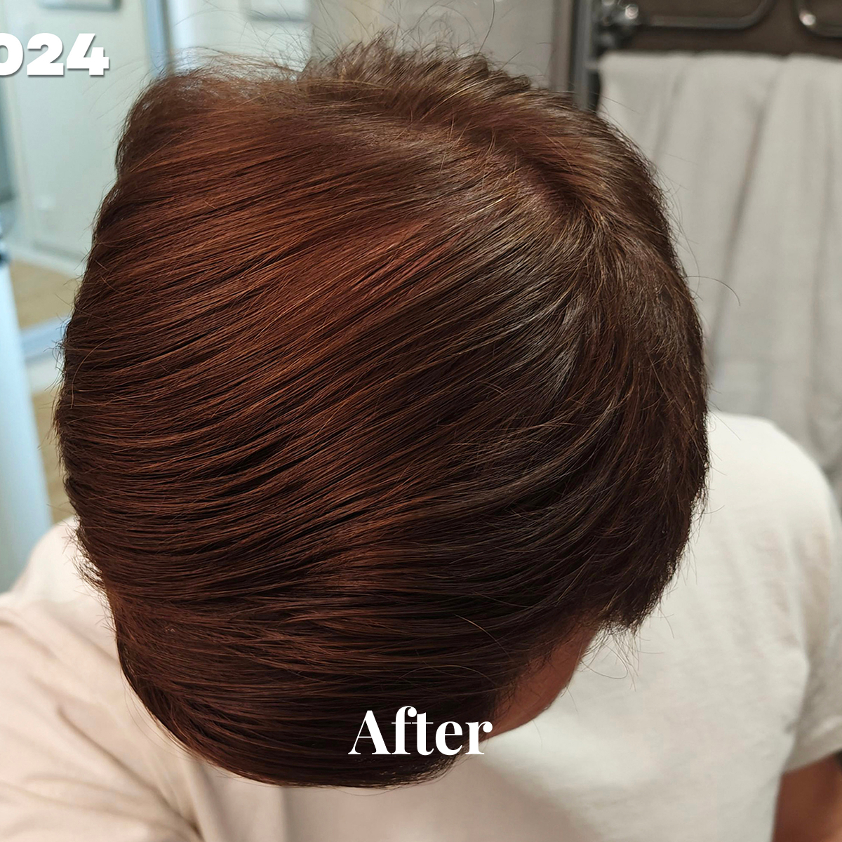 Top view of styled, smooth, shiny brown hair after treatment.