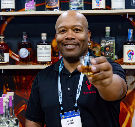 Staff member interacting with customers at WSWA event