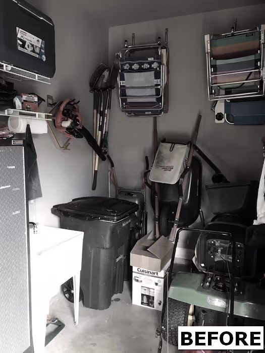 Storage area with various items piled up and disorganized.