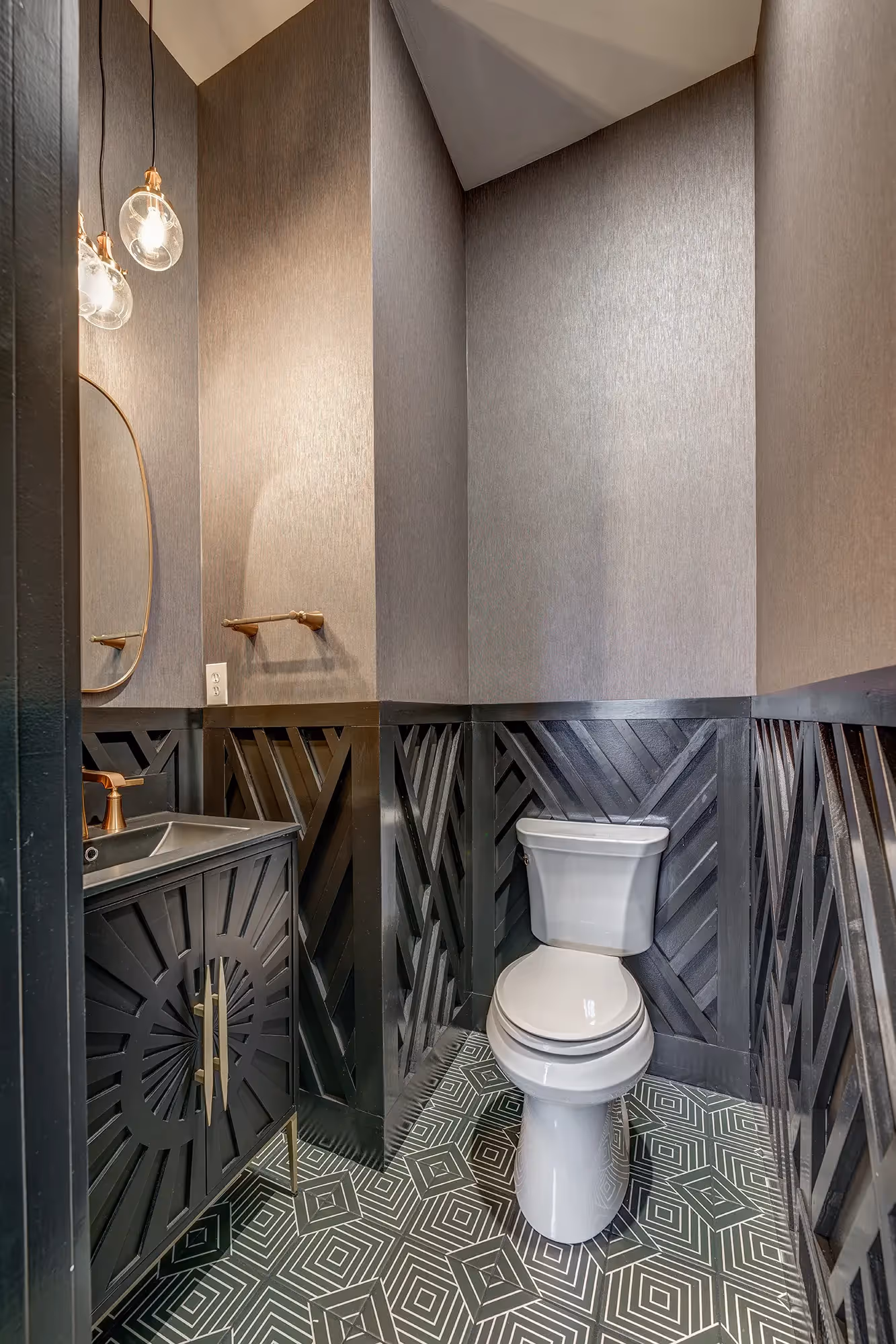Stylish contemporary bathroom in mechanicsburg, pa featuring black herringbone wood accents and geometric tile flooring