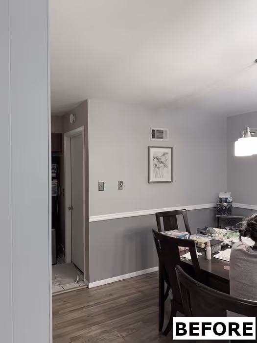 Kitchen area with dark cabinets