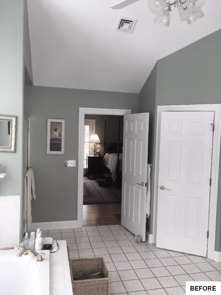Luxurious bathroom with a light green color scheme, featuring a bathtub and access to a bedroom, located in Hummelstown, PA.