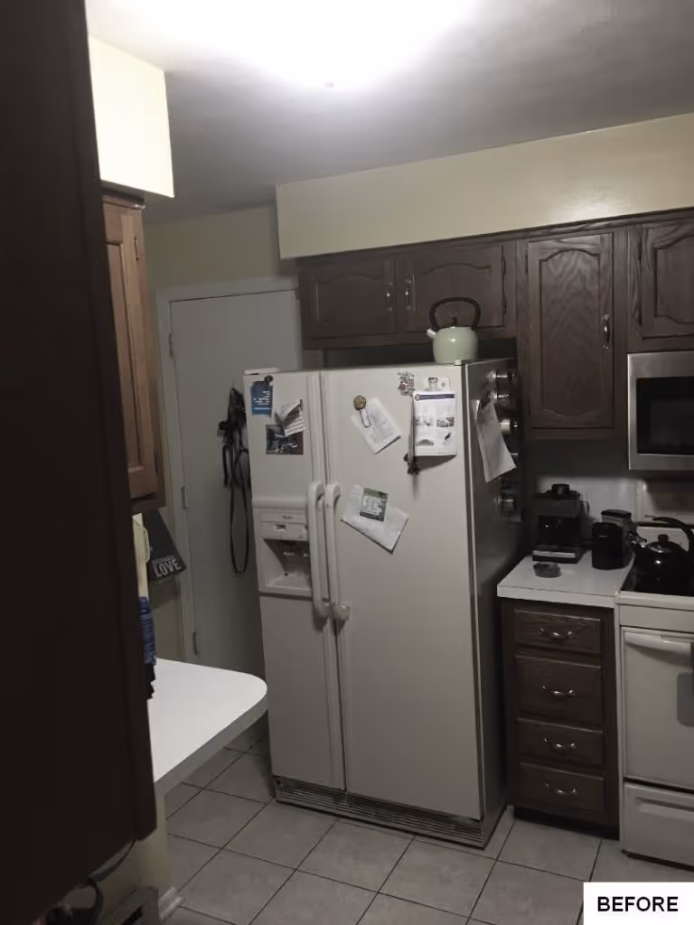 Functional kitchen with wooden cabinets and tile floors, located in mechanicsburg, pa.