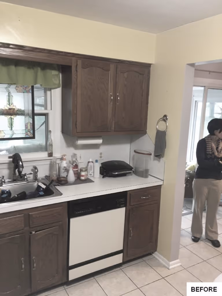 Kitchen with oak cabinets and tiled floor showcasing a clean and functional design in Mechanicsburg, PA.
