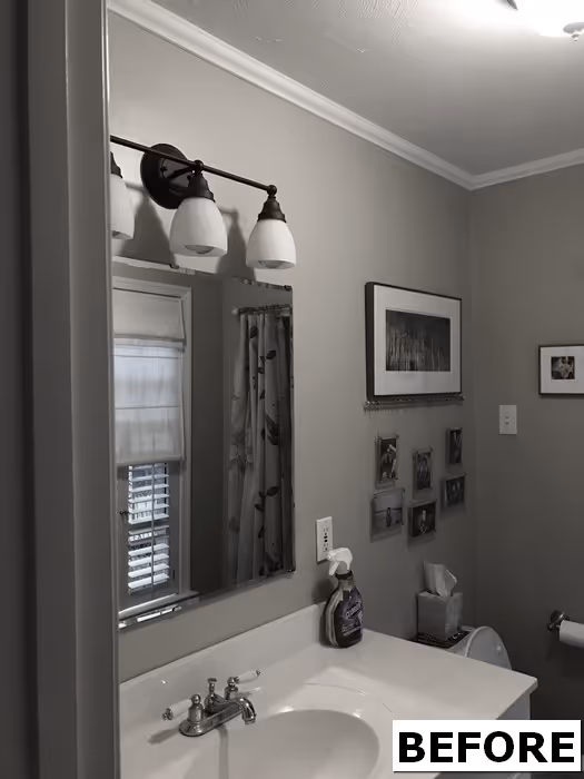 Modern bathroom with gray walls, white sink, and contemporary lighting fixtures in New Cumberland, PA