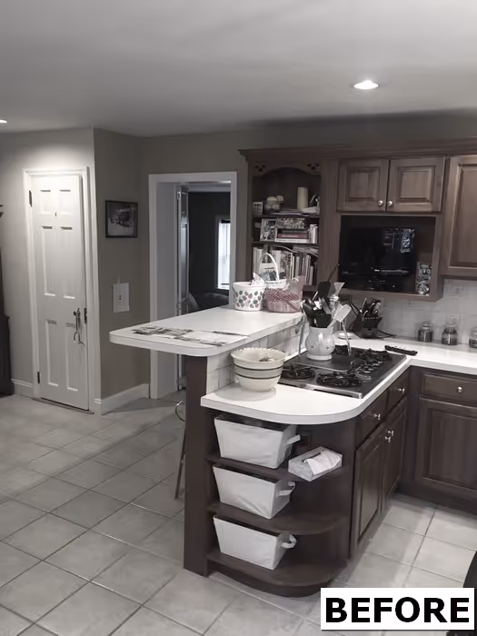 Cozy transitional kitchen with wood cabinetry and tile flooring in New Cumberland, PA.