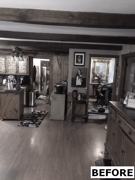 Rustic kitchen and dining area with wooden cabinets and beams in Mechanicsburg, PA