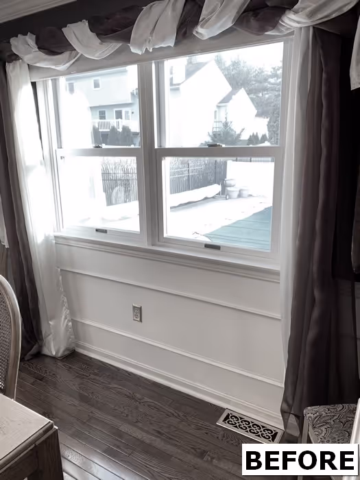 Bright dining room window with sheer drapes, wood floors, and a winter view in mechanicsburg, pa.