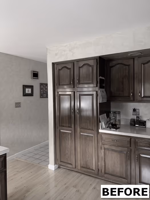 Traditional kitchen with dark wood cabinets and a granite countertop in Mechanicsburg, PA