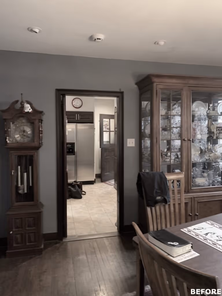 Transitional dining room in Harrisburg, PA with wooden furniture and a view to the kitchen