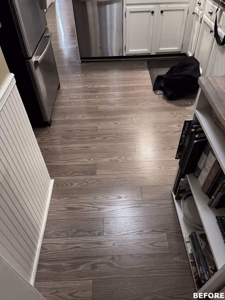 Modern kitchen with sleek stainless steel appliances and light hardwood flooring in Camp Hill, PA.