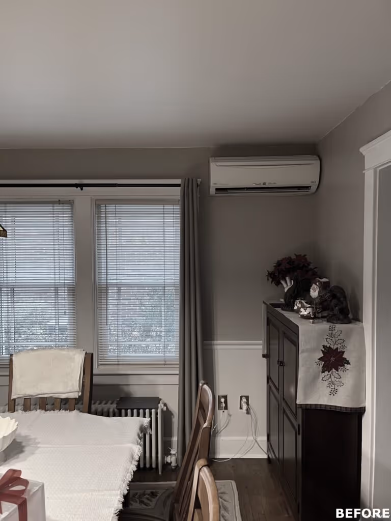 Cozy dining room with wooden furniture, neutral colors, and decorative accents in Camp Hill, PA
