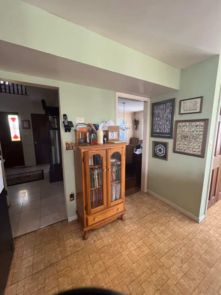 A cozy kitchen space in Mechanicsburg, PA, featuring wooden cabinets and vintage decor, creating a warm atmosphere.