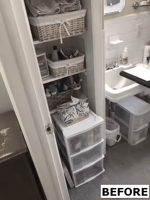 Small bathroom storage in Harrisburg, PA with organized baskets and containers next to a sink.