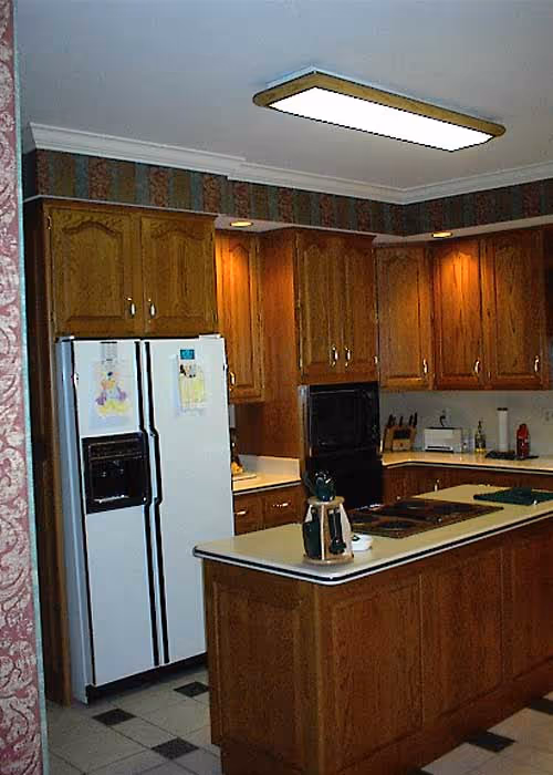 Spacious traditional kitchen featuring oak cabinets and white appliances in harrisburg, pa