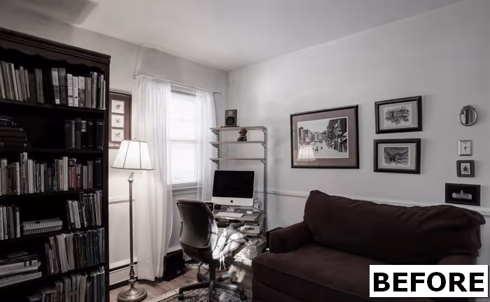 Cozy home office with dark brown sofa, bookshelves, and desk setup in Camp Hill, PA.