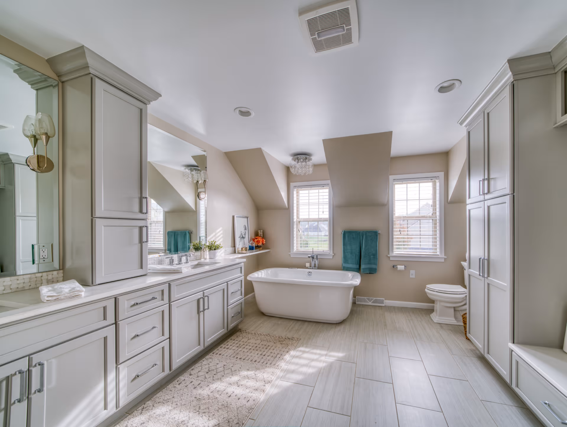 Luxury bathroom in Elizabethtown, PA featuring a freestanding tub, dual vanities, and elegant fixtures.