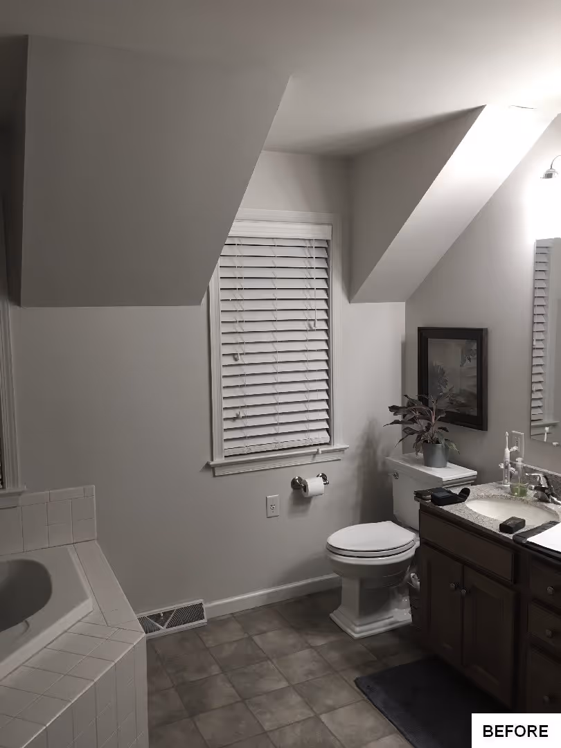 Transitional bathroom featuring a toilet and a sink with wood cabinetry in elizabethtown, pa