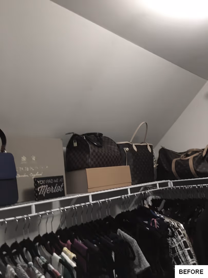 Organized closet with handbags, clothing, and a decorative sign in Elizabethtown, PA