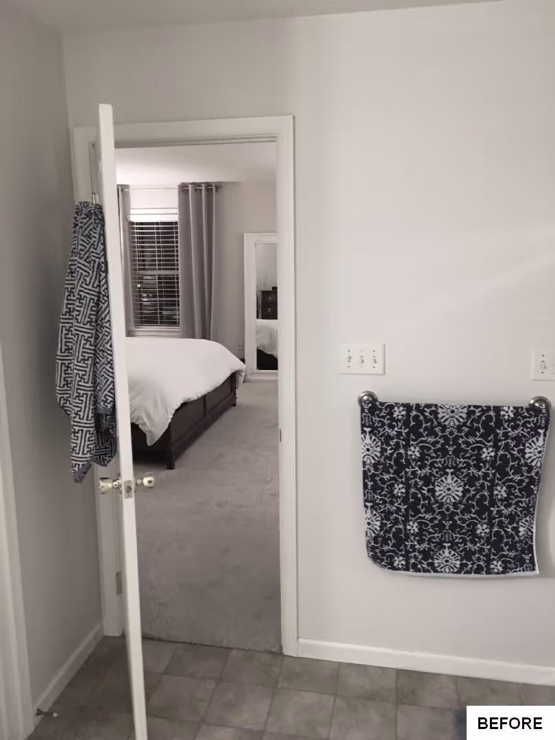 Transitional bathroom view into a bedroom, featuring a gray palette and patterned towel in Elizabethtown, PA.