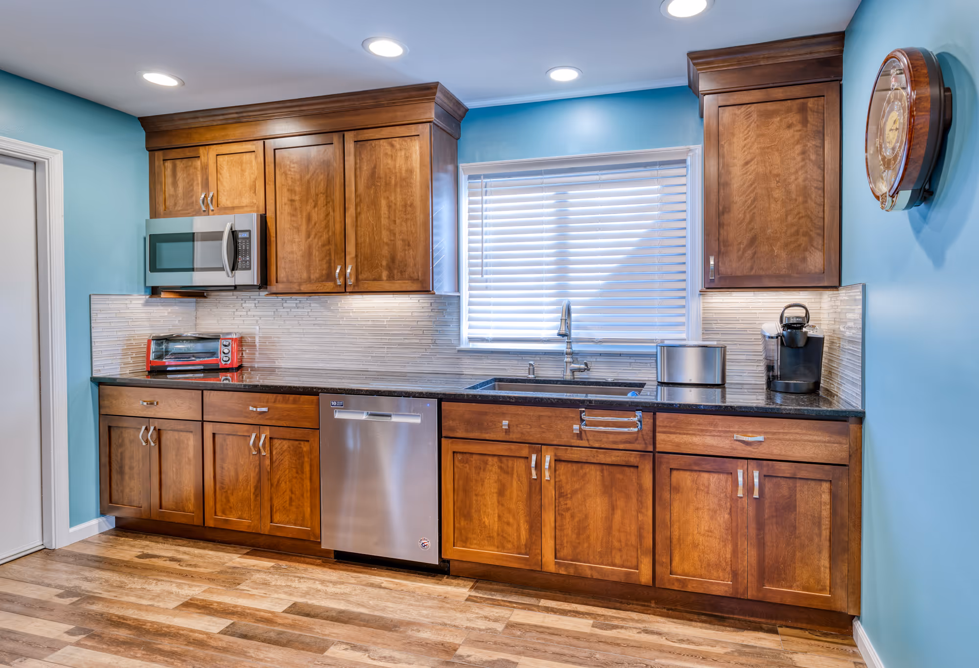 Modern kitchen with wood cabinets and stainless steel appliances in hershey, pa