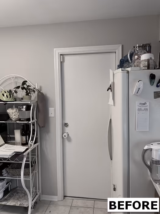 Before photo of a cluttered kitchen featuring a white refrigerator and metal shelving in hershey, pa.