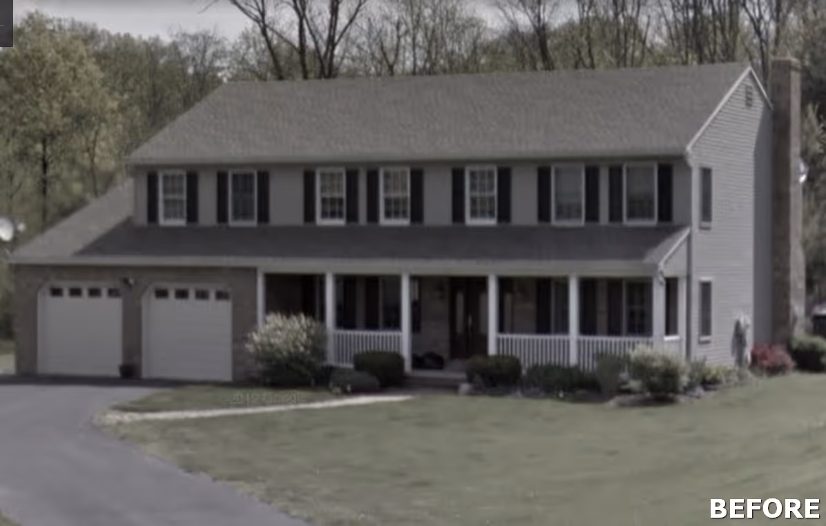 Traditional exterior view of a grey house with white accents and black shutters in Dillsburg, PA