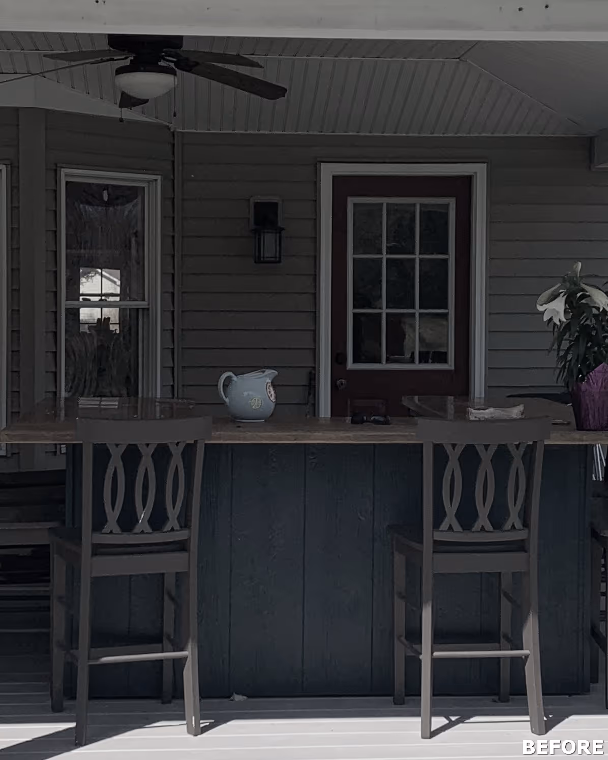 Stylish outdoor bar area featuring wooden stools and a fan, located in Dillsburg, PA.