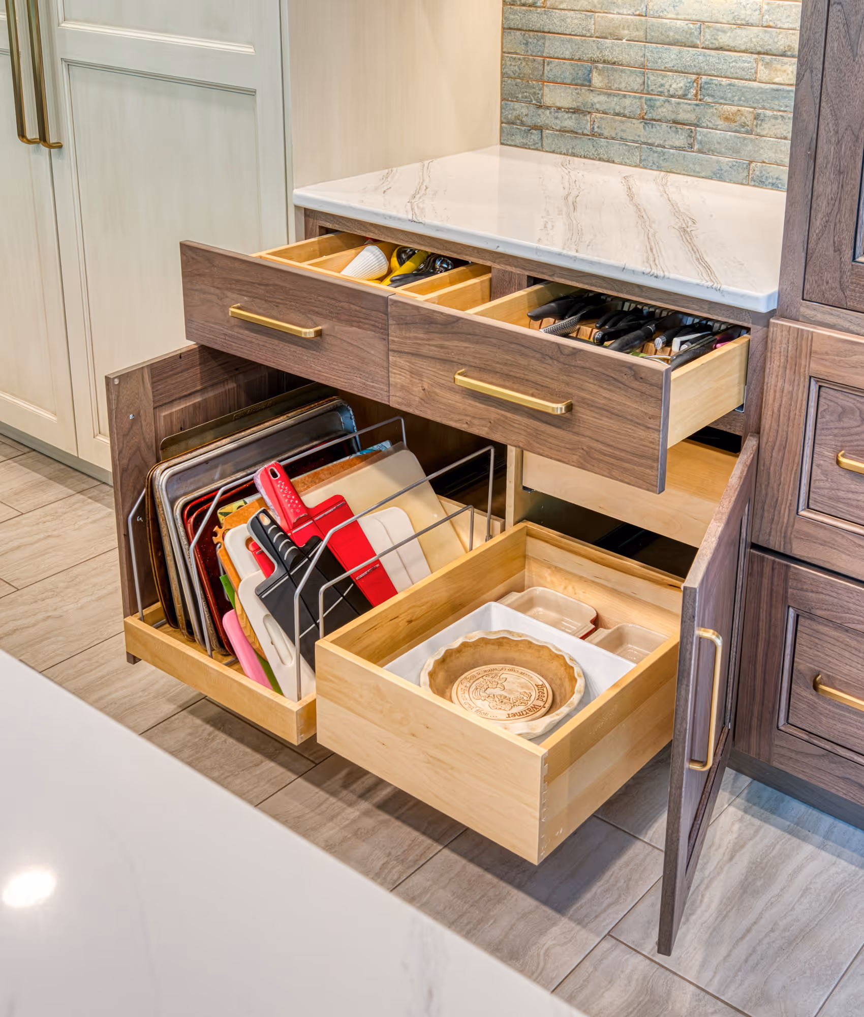 Modern kitchen storage solutions featuring wood and marble countertops in Mechanicsburg, PA.