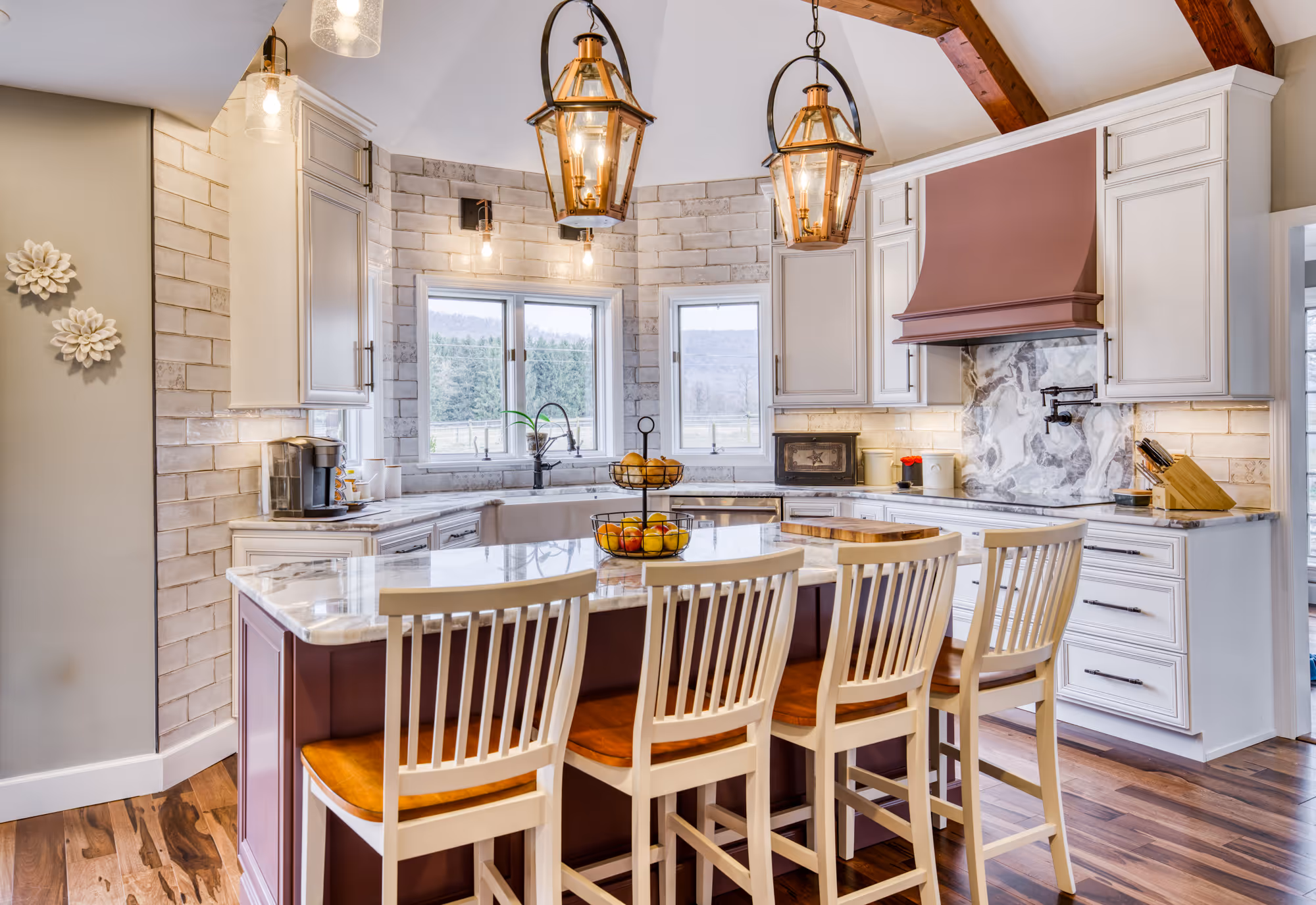 Cozy modern kitchen with granite countertop, lantern pendant lighting, and farmhouse accents in enola, pa