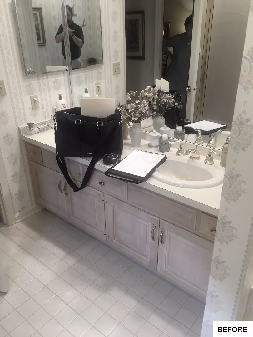 Transitional bathroom with light-colored cabinets and floral accents in hershey, pa