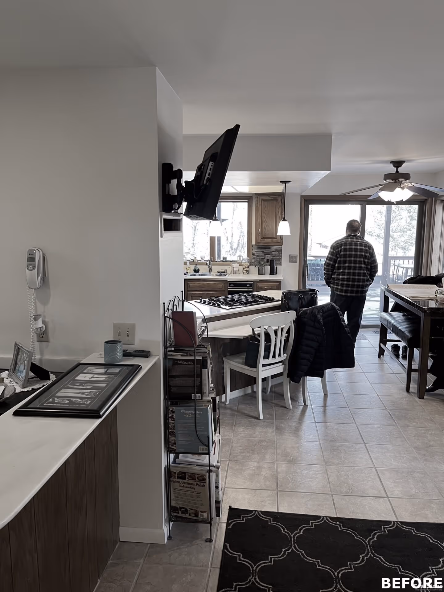 Open modern kitchen with light wood cabinets and a dining area in Harrisburg, PA