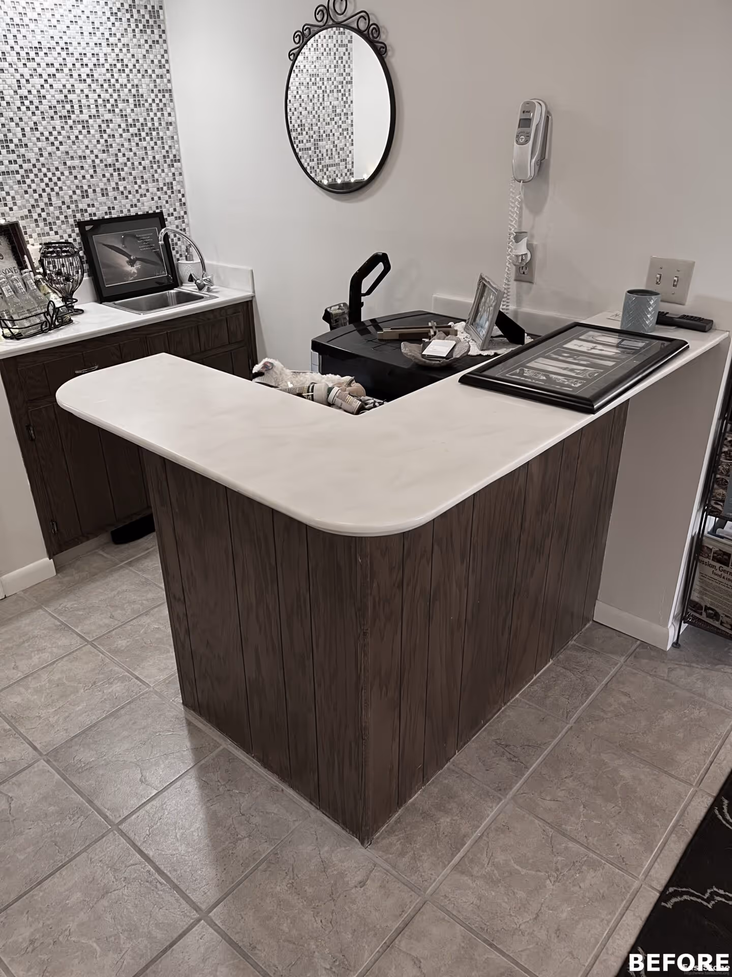 Transitional kitchen with a white countertop, dark wood cabinets, and a decorative tile backsplash in Harrisburg, PA.
