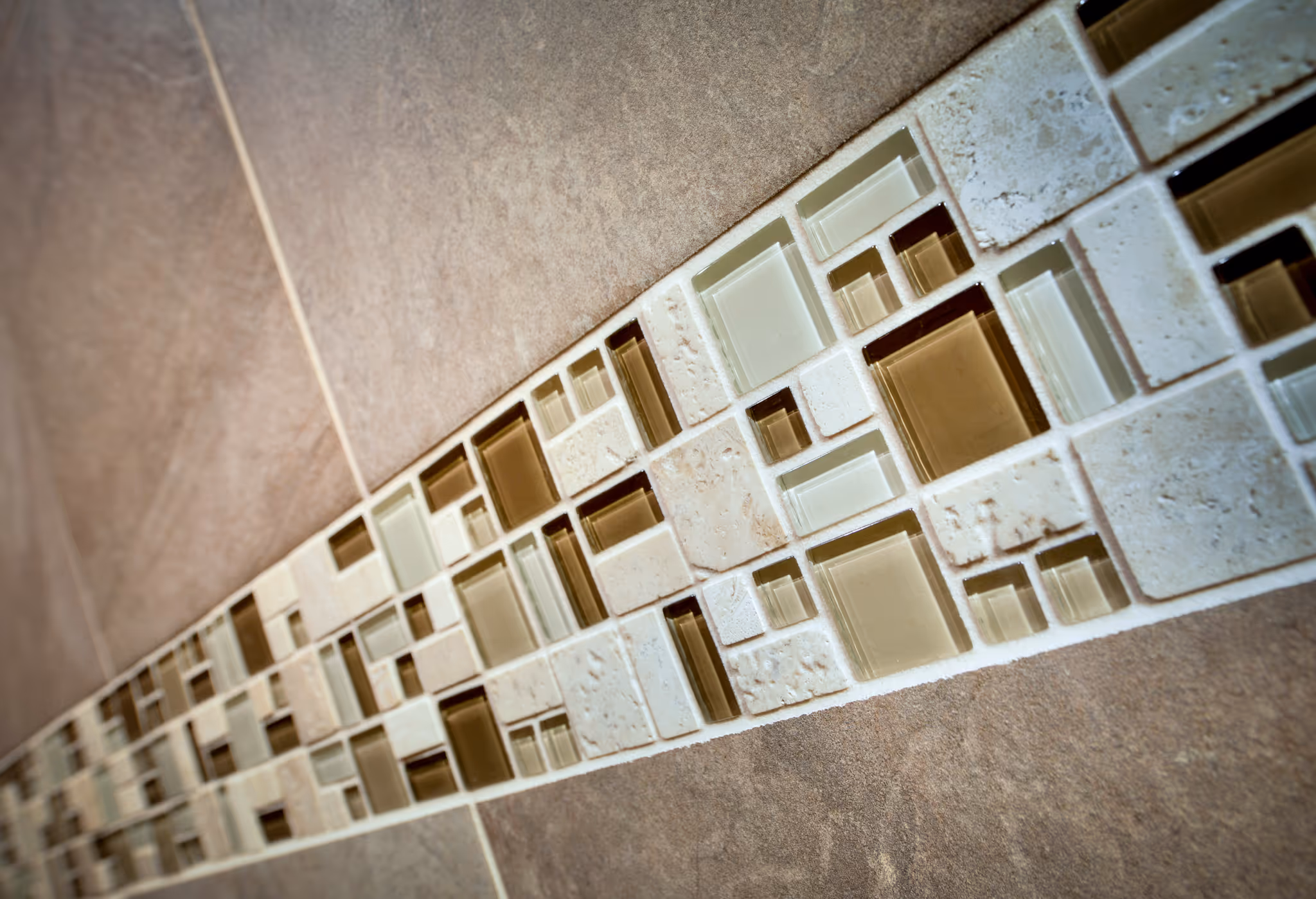 Mosaic tile backsplash featuring beige and glass accent tiles in a modern kitchen in Carlisle, PA