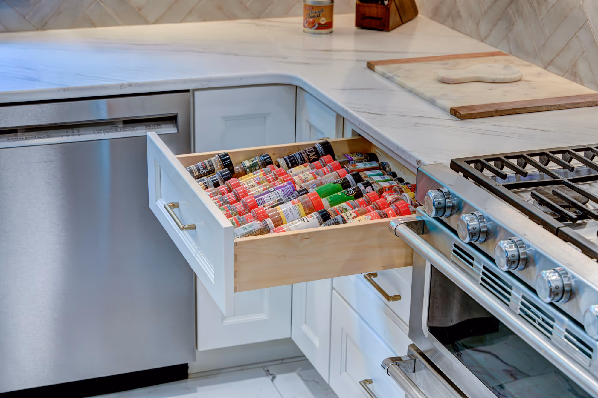 Modern kitchen spice drawer featuring organized spice jars, high-end appliances, and sleek cabinetry in gettysburg, pa.