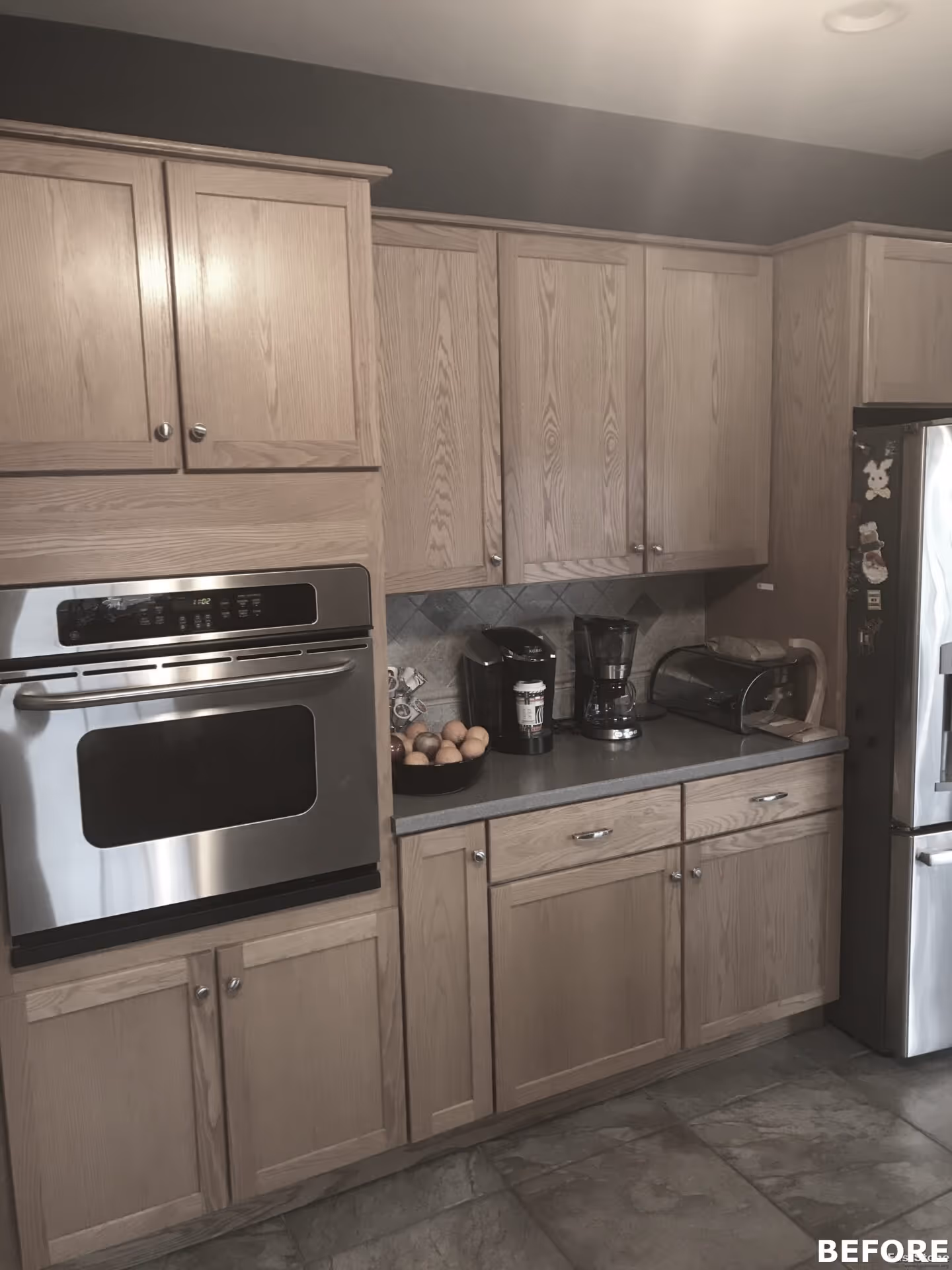 Modern kitchen in Mechanicsburg, PA with oak cabinets and stainless steel appliances