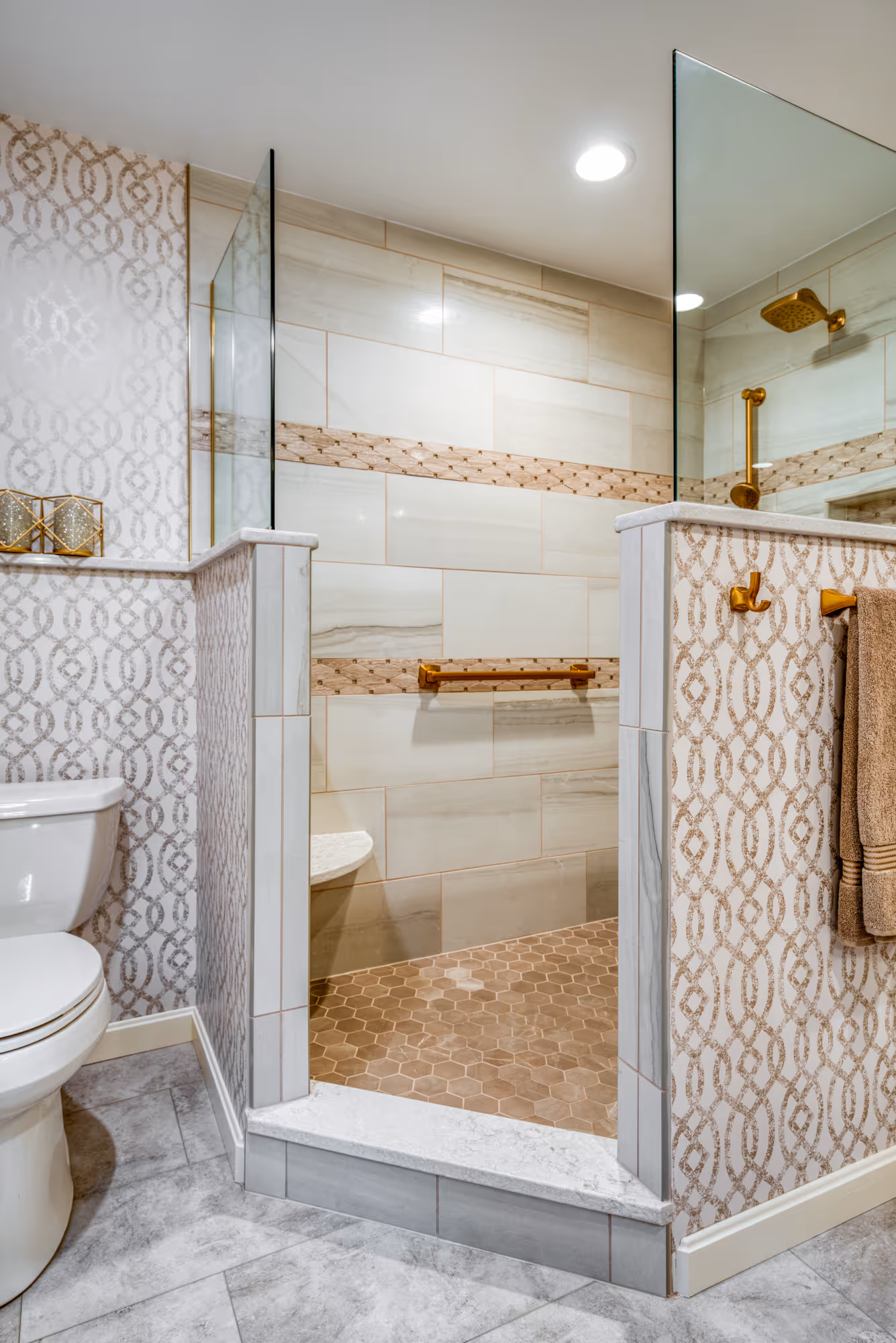 Elegant primary bathroom remodel in Mechanicsburg, PA featuring a walk-in shower with glass enclosure and modern fixtures.